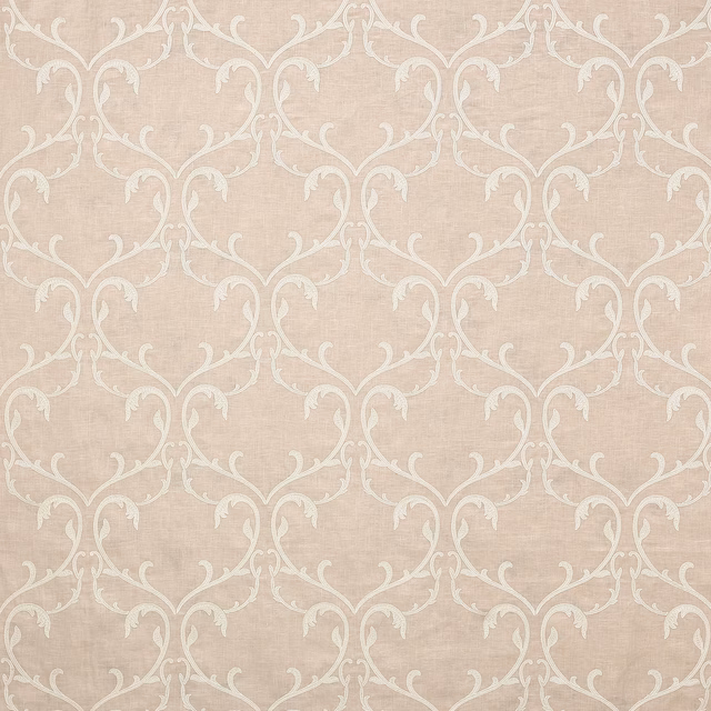 Soft blush pink damask fabric with pale scrolling vine motif