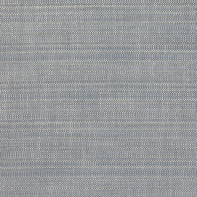 Close-up of a soft misty blue woven fabric with tiny cream flecks