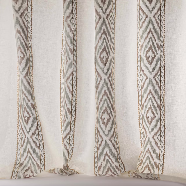 Sheer beige fabric with vertical geometric woven stripes in taupe and soft sage