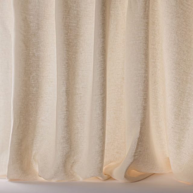 Soft warm cream linen sheer curtain with subtle textured weave and gentle folds