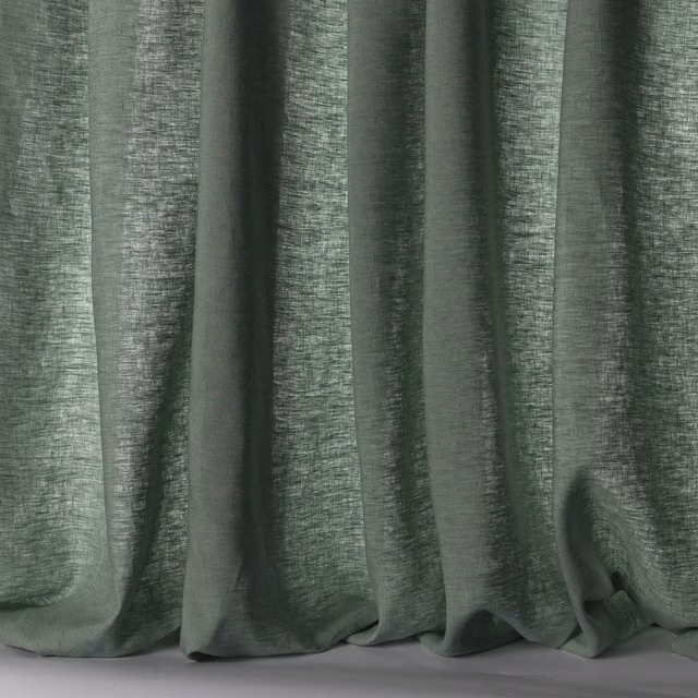 Soft forest green linen sheer with subtle slubbed texture and vertical folds