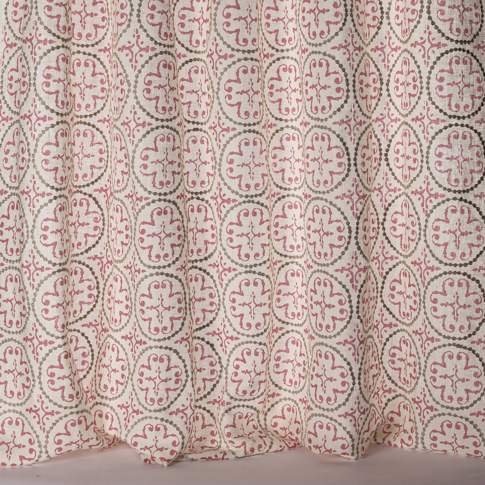 Pink and olive geometric sheer with rounded medallions and a linen texture