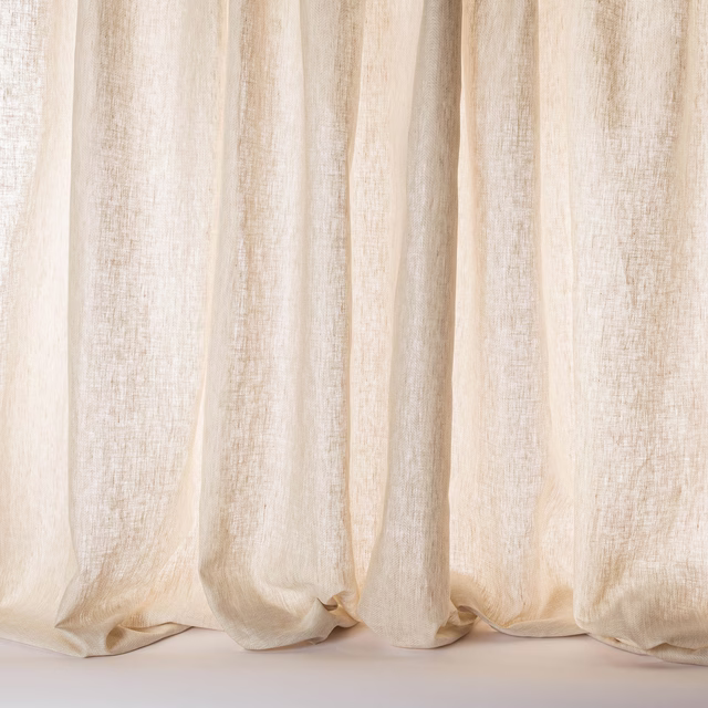 Soft beige linen sheer curtains with a light slubbed weave and gentle vertical folds