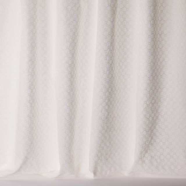 Ivory sheer fabric with tiny geometric diamond pattern and soft vertical folds