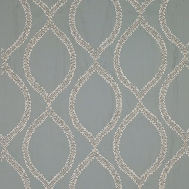 Soft old blue fabric with ivory leaf-lattice oval pattern