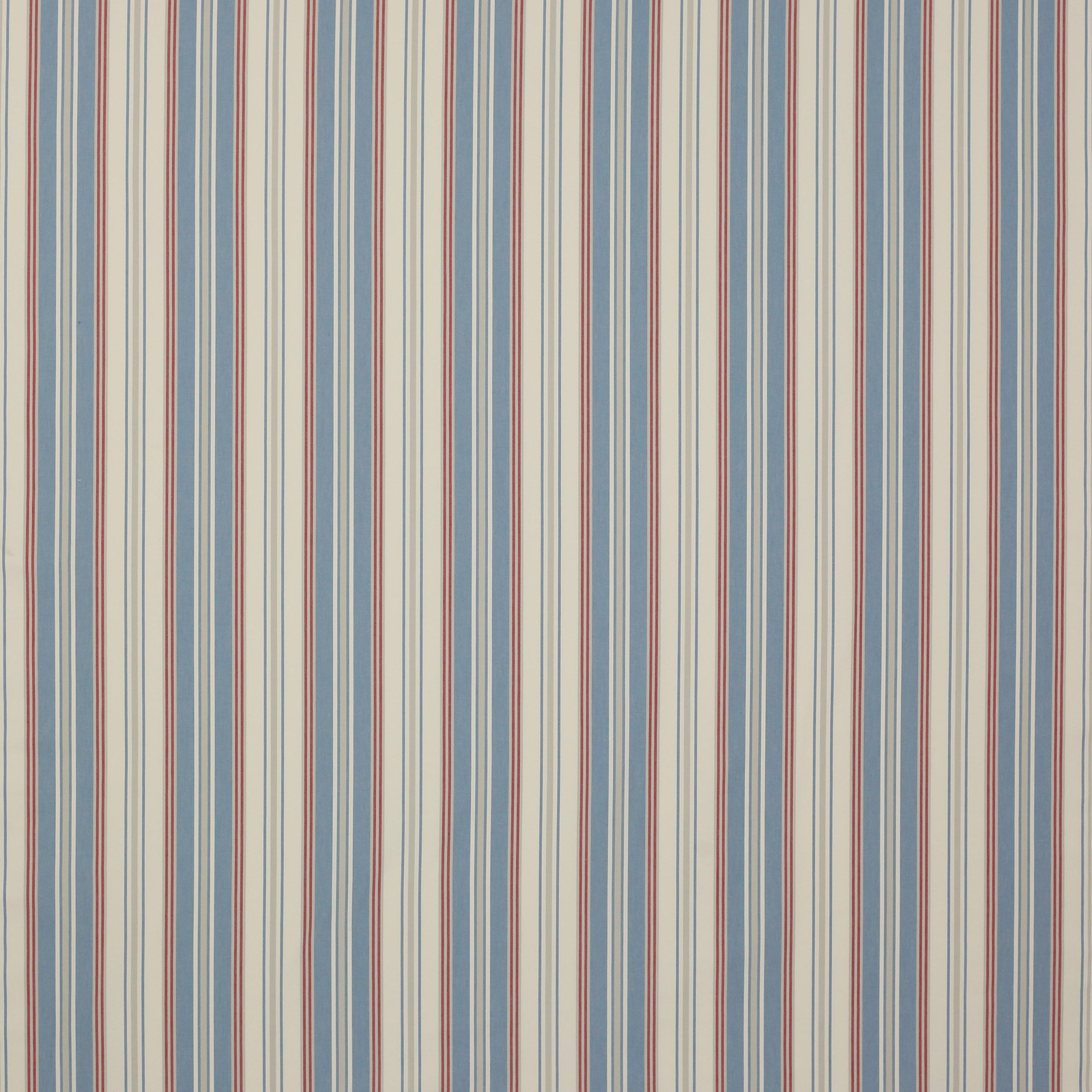Vertical blue and red stripe cotton swatch on a cream ground