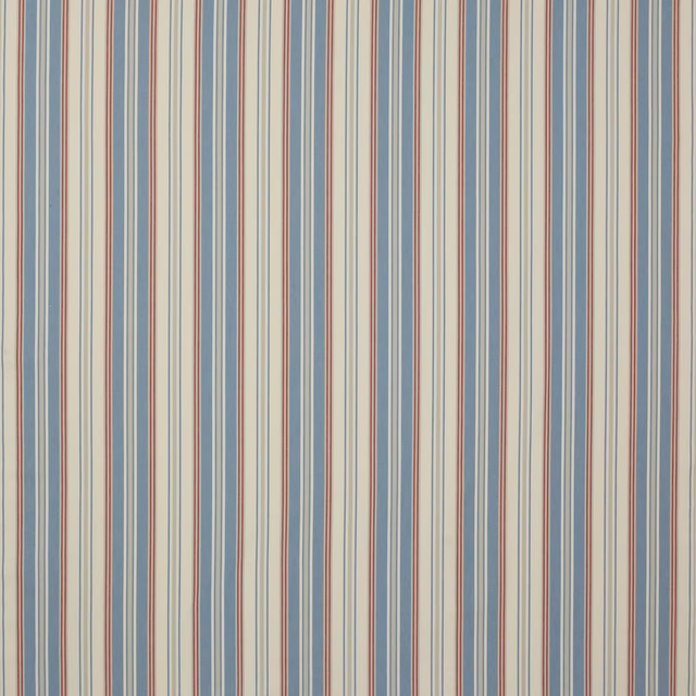 Vertical blue and red stripe cotton swatch on a cream ground