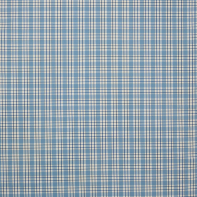 Soft blue and ivory checked cotton swatch with a medium-scale plaid pattern