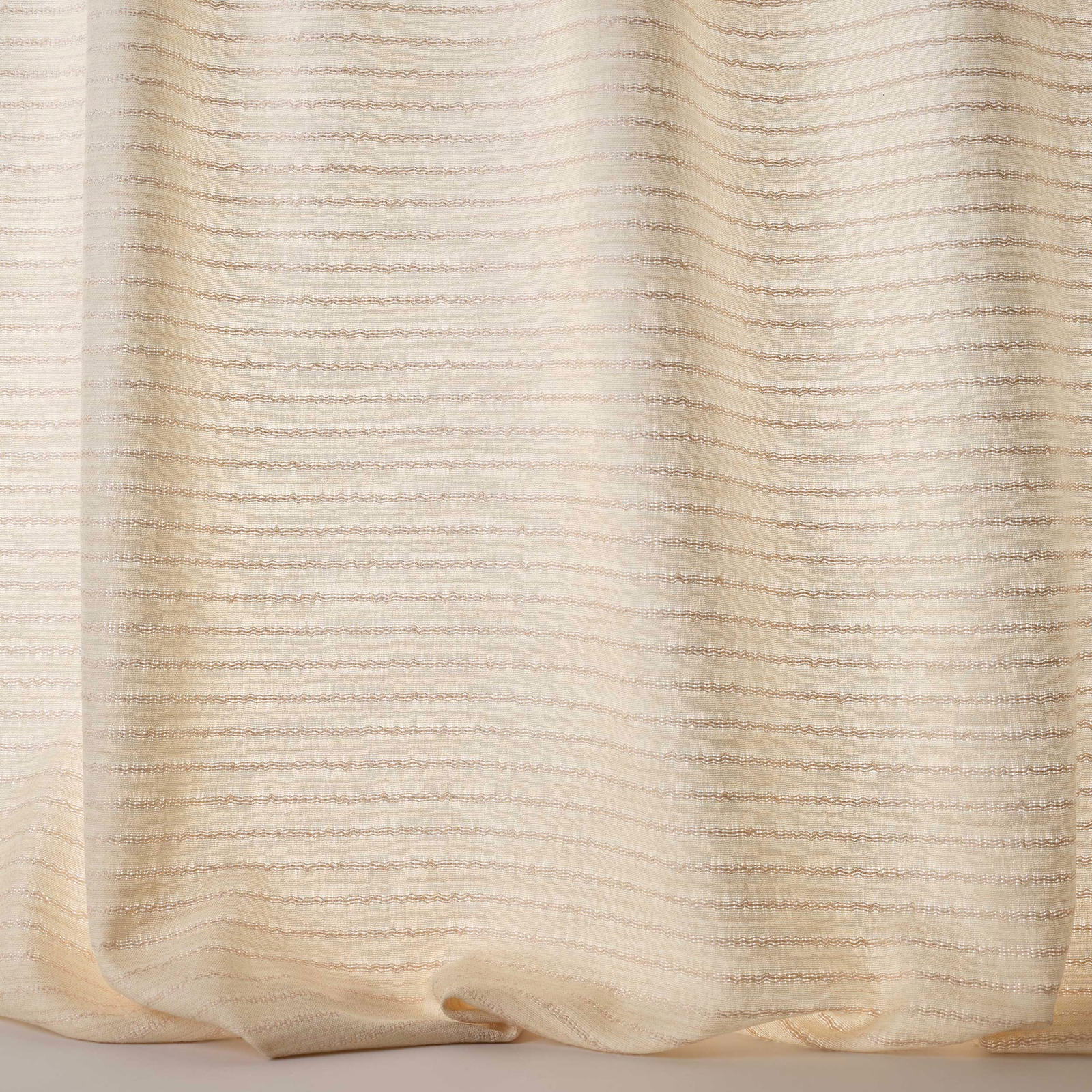 Cream striped woven fabric with fine horizontal texture and soft drape