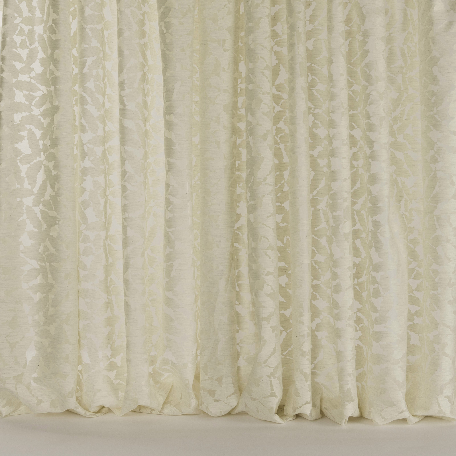 Creamy sand floral fabric with subtle woven texture and soft vertical folds