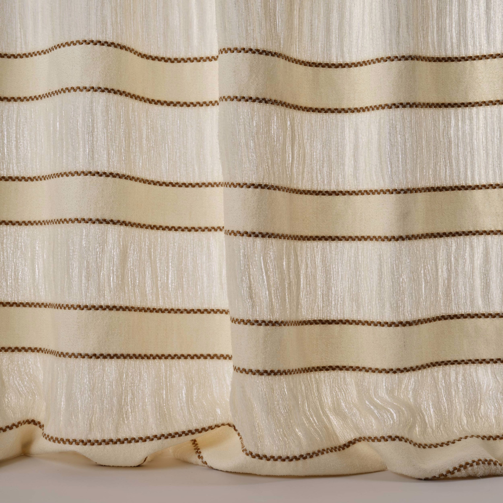 Creamy sand fabric with narrow brown horizontal stripes and a softly rippled sheen