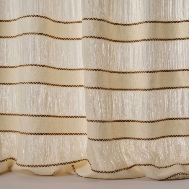 Creamy sand fabric with narrow brown horizontal stripes and a softly rippled sheen