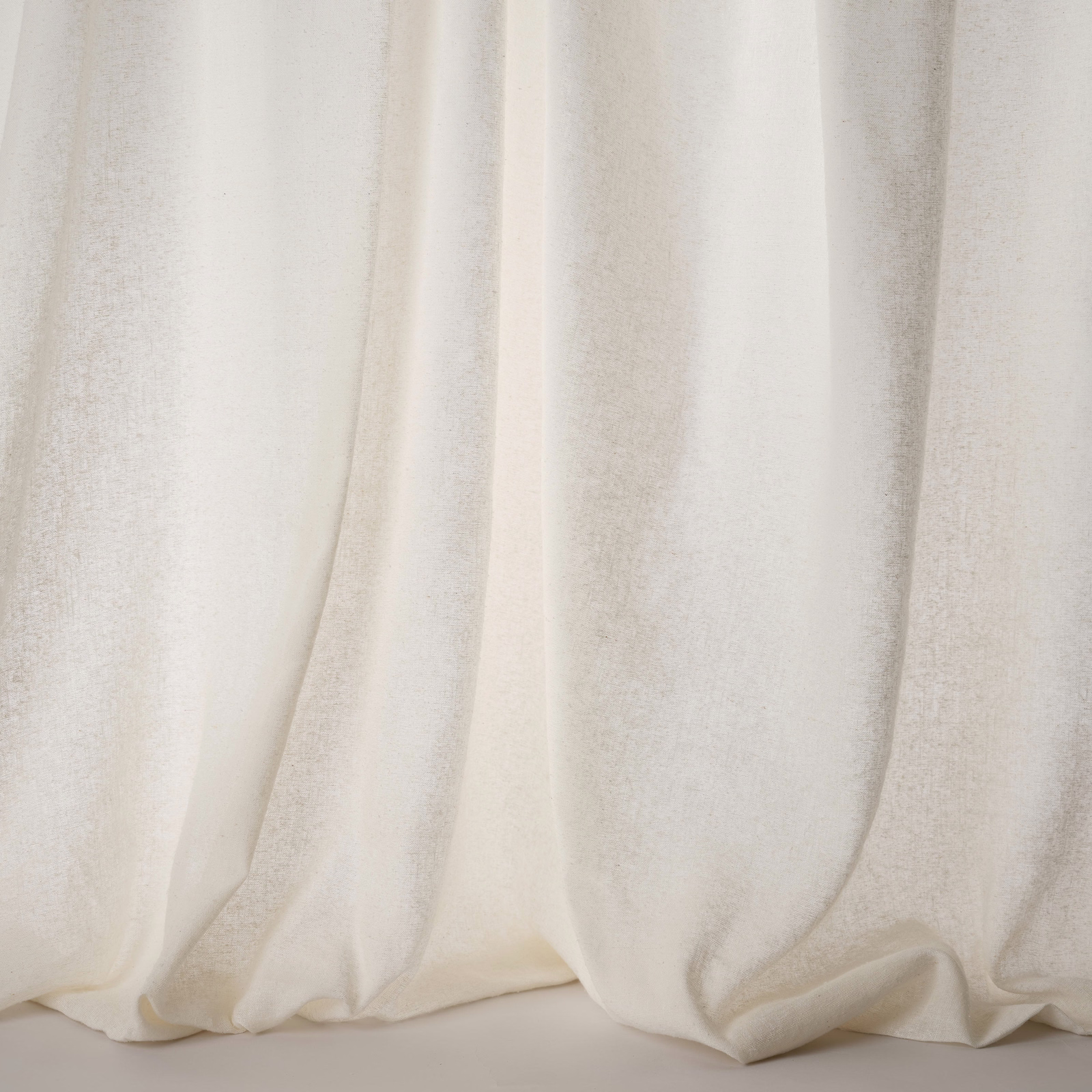 Soft ivory cream plain woven fabric with gentle drape and fine texture