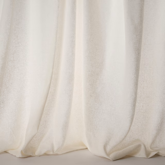 Soft ivory cream plain woven fabric with gentle drape and fine texture