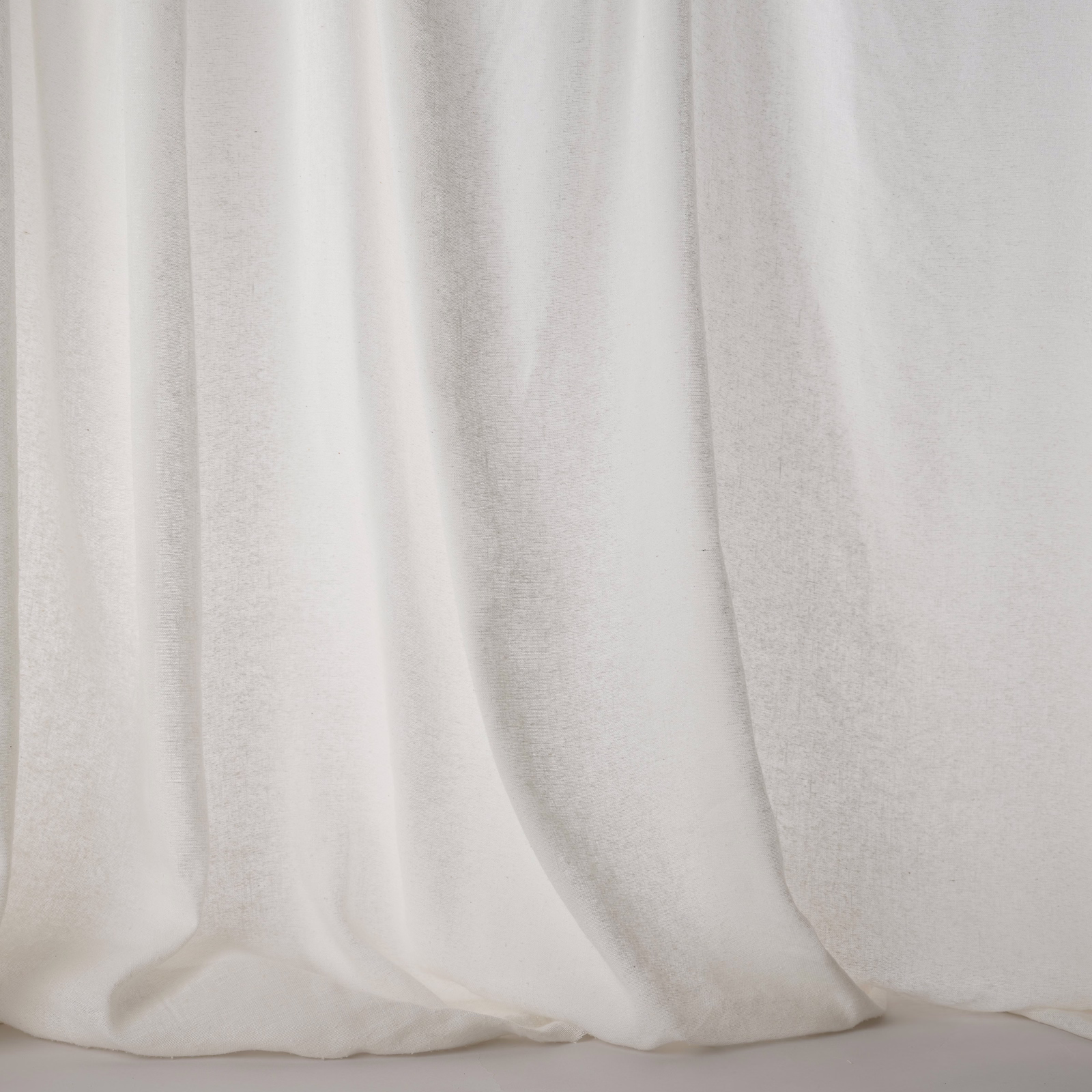Soft ivory white plain fabric with a gentle silky sheen and subtle linen texture