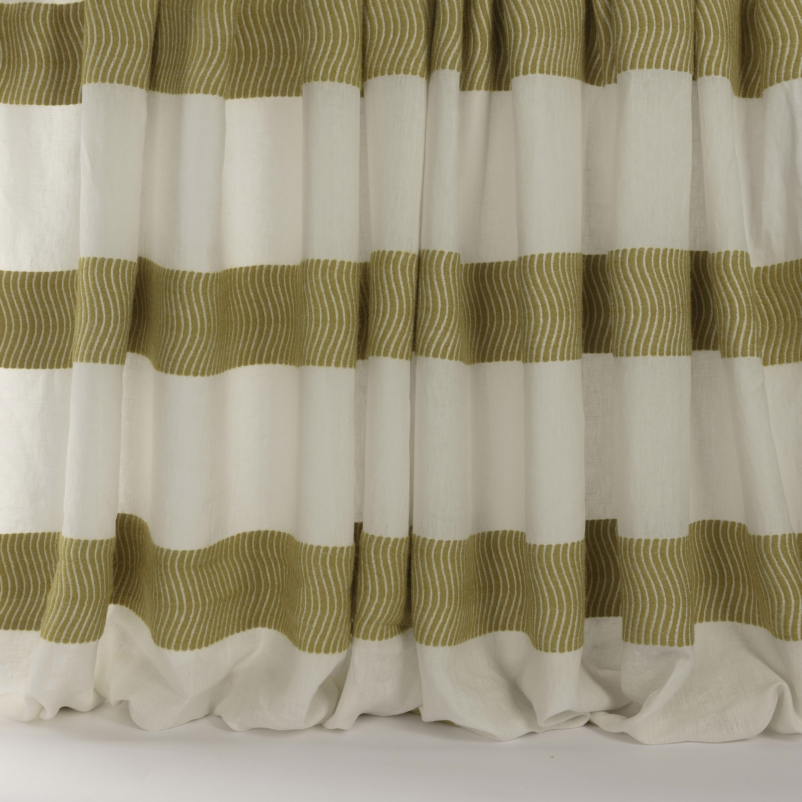 Cream curtain fabric with broad saffron-gold wavy striped bands