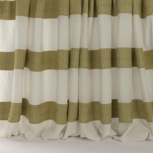 Cream curtain fabric with broad saffron-gold wavy striped bands