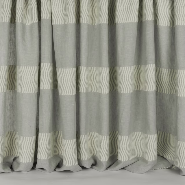 Soft grey striped fabric with wide bands and fine wavy linear detailing