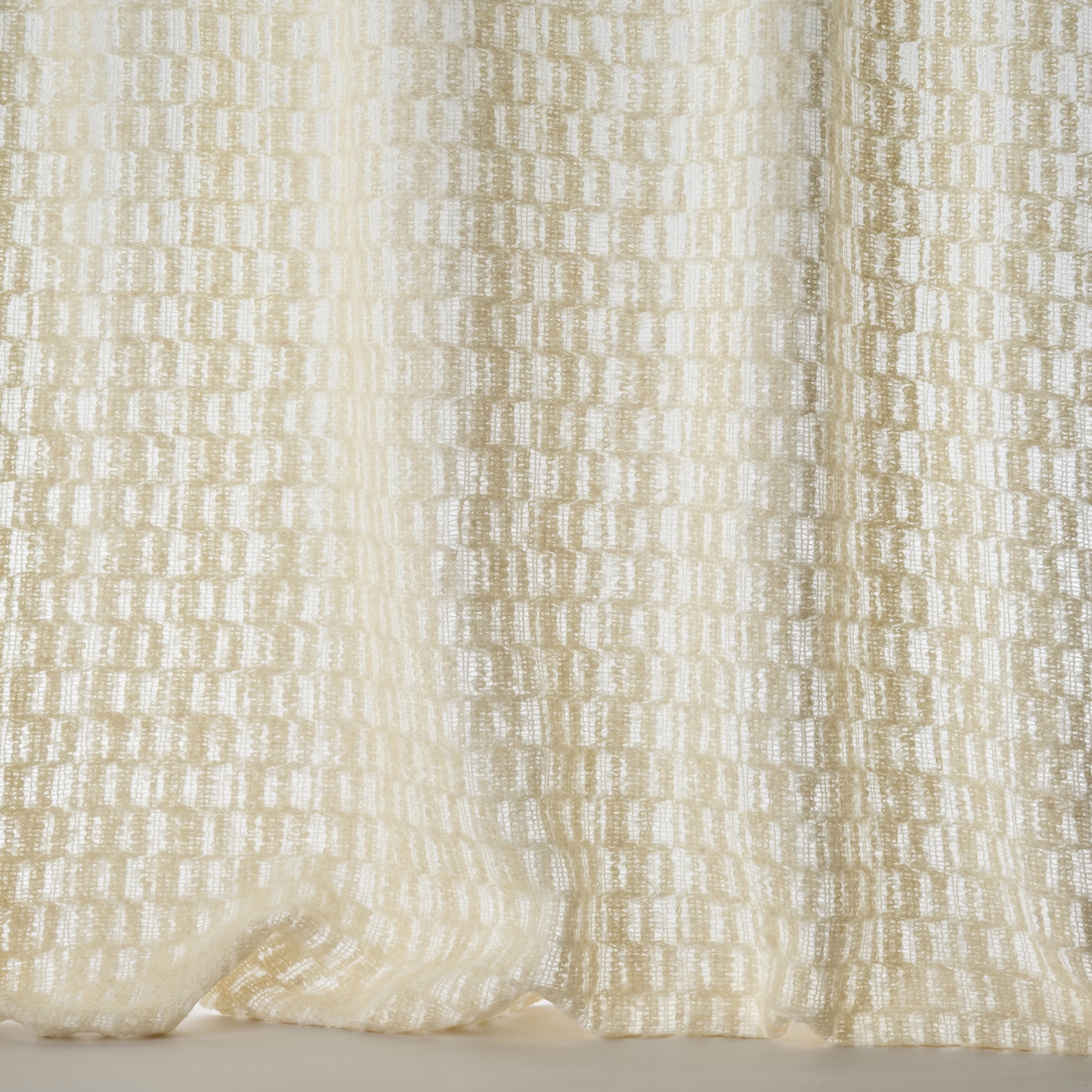 Pale cream textured woven fabric with subtle vertical striations and soft sheen