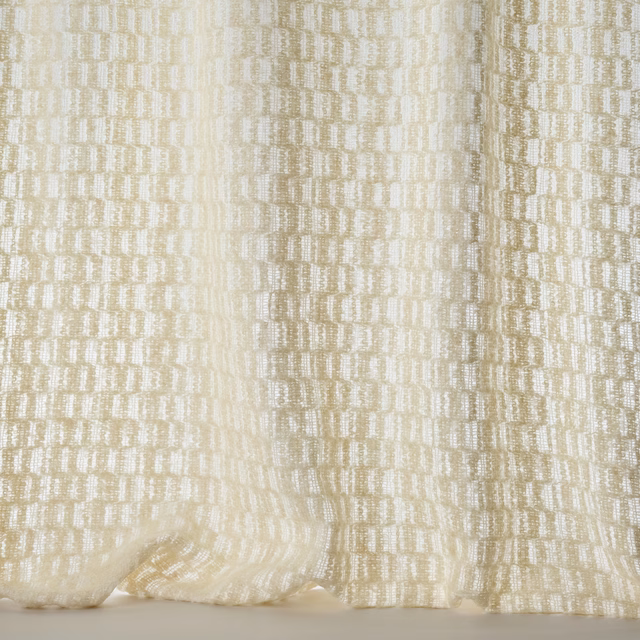 Pale cream textured woven fabric with subtle vertical striations and soft sheen