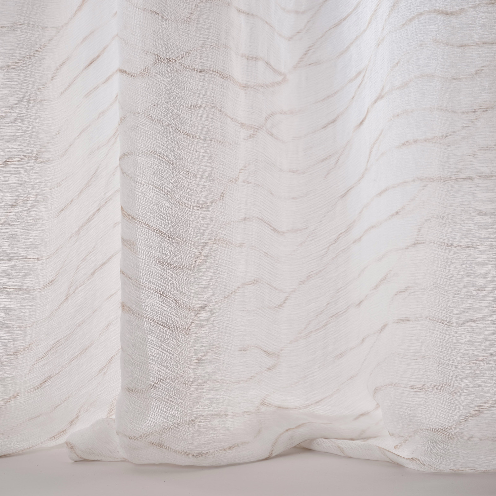 Pale sand-ivory sheer fabric with fine horizontal wave-like texture and soft drape