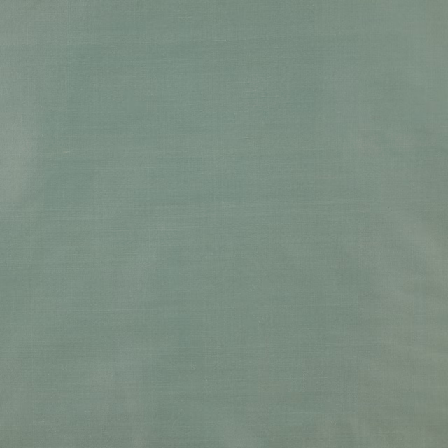 Plain antique jade silk fabric with a soft, matte-lustrous sheen