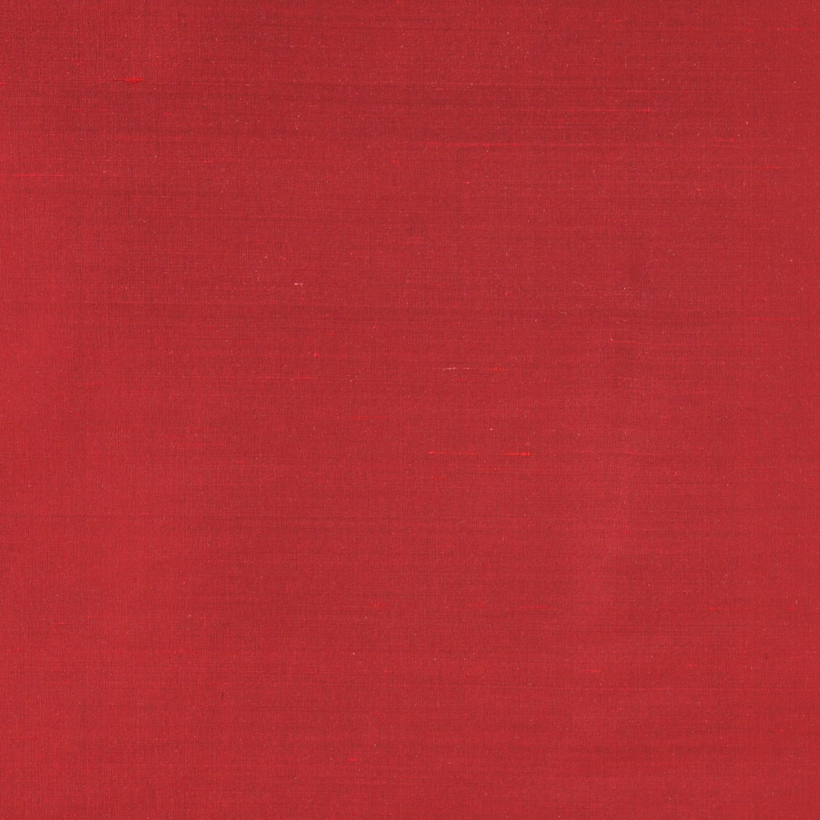 Deep cardinal red silk swatch with subtle horizontal sheen and fine slub texture