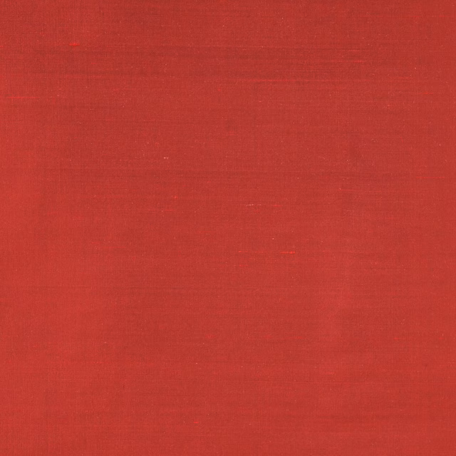 Deep cardinal red silk swatch with subtle horizontal sheen and fine slub texture