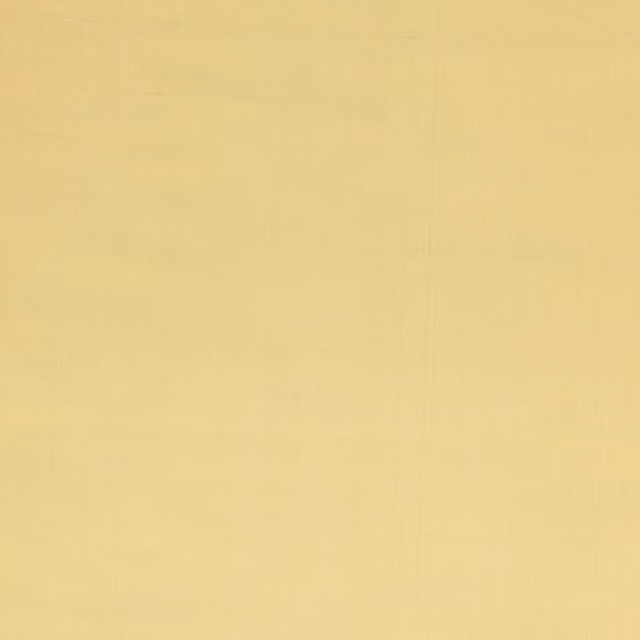 Plain soft ochre silk fabric with a smooth, luminous surface