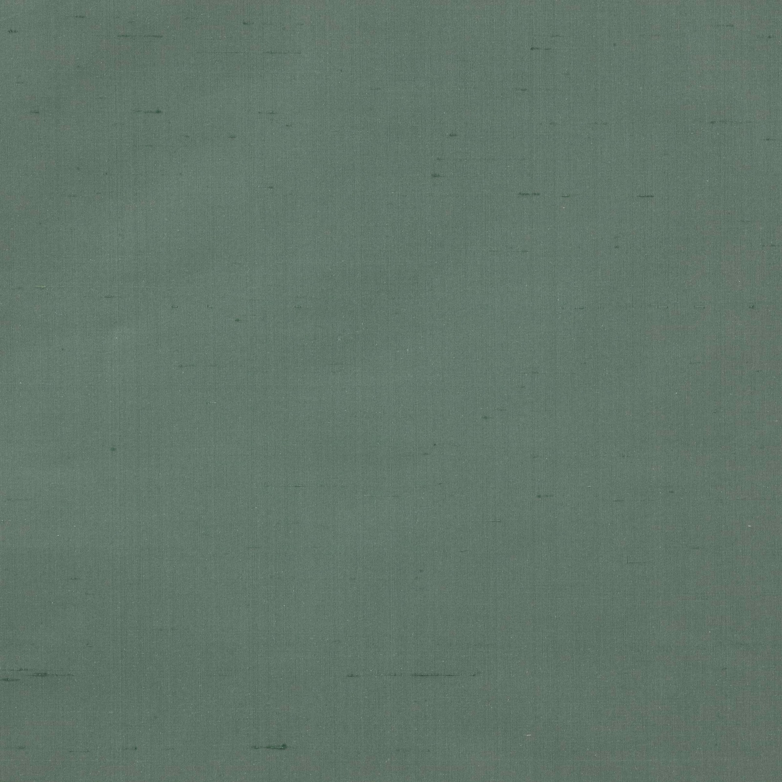 Muted spruce green silk fabric with subtle slub texture and soft sheen