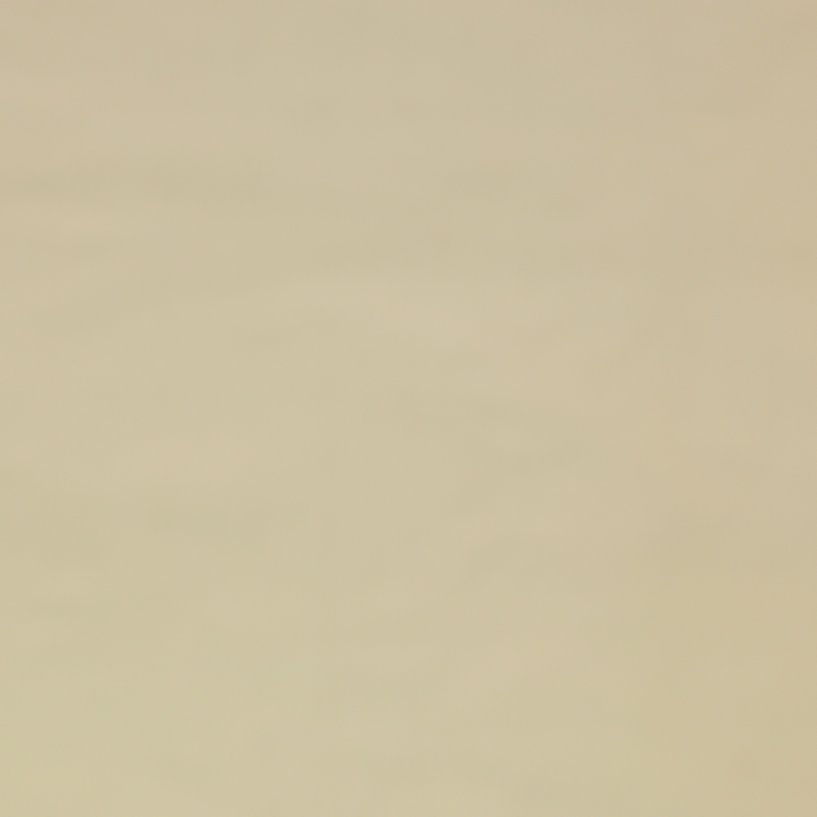 Plain soft taupe silk fabric with a gentle lustre and smooth surface