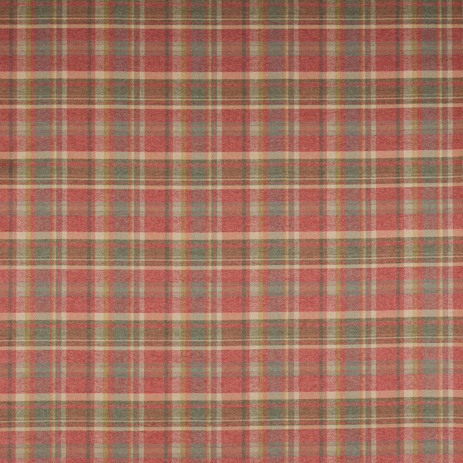 Muted red and green tartan plaid fabric with a softly woven texture