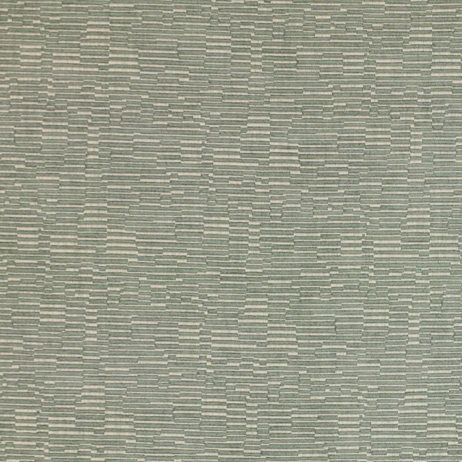 Close-up of soft celadon green woven fabric with fine horizontal textured stripes