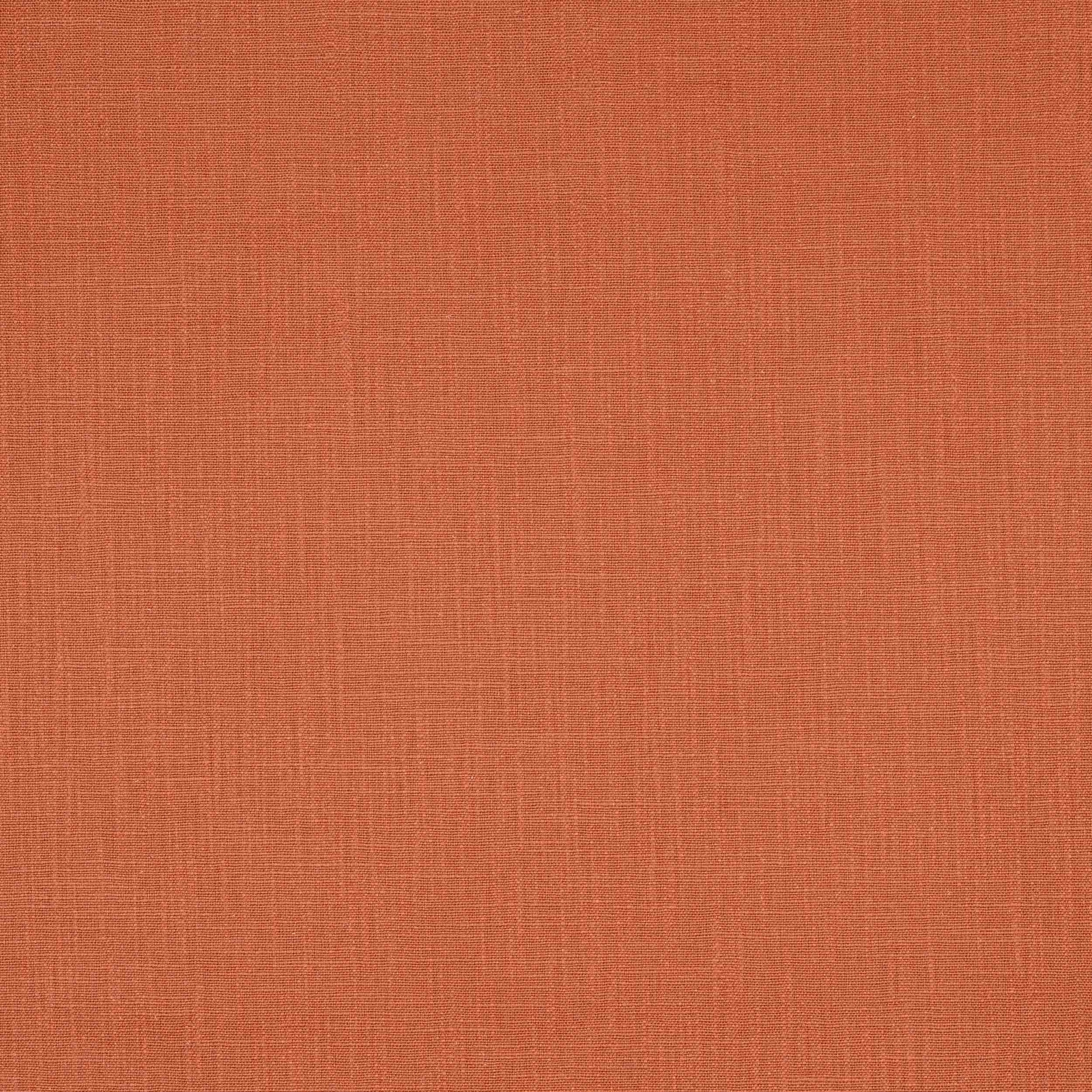 Soft terracotta plain woven fabric with a natural linen texture