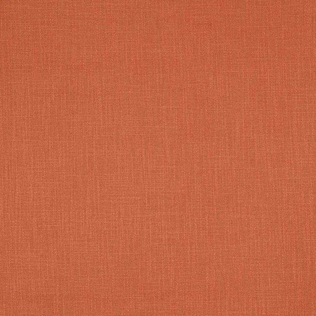 Soft terracotta plain woven fabric with a natural linen texture