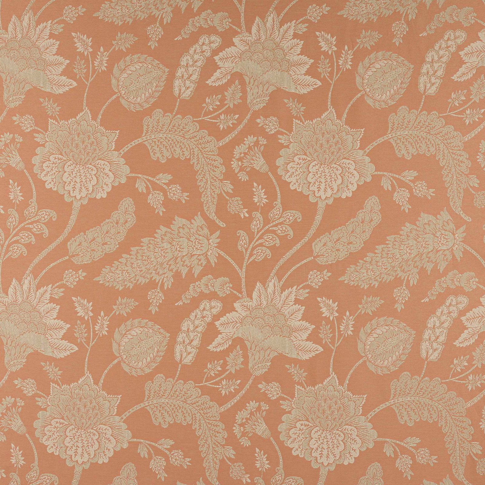 Cream floral and leaf motif on a warm russet terracotta woven fabric