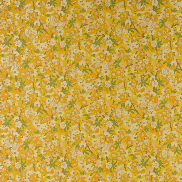 Dense small floral fabric in marigold yellow, cream and green, with a busy woven look