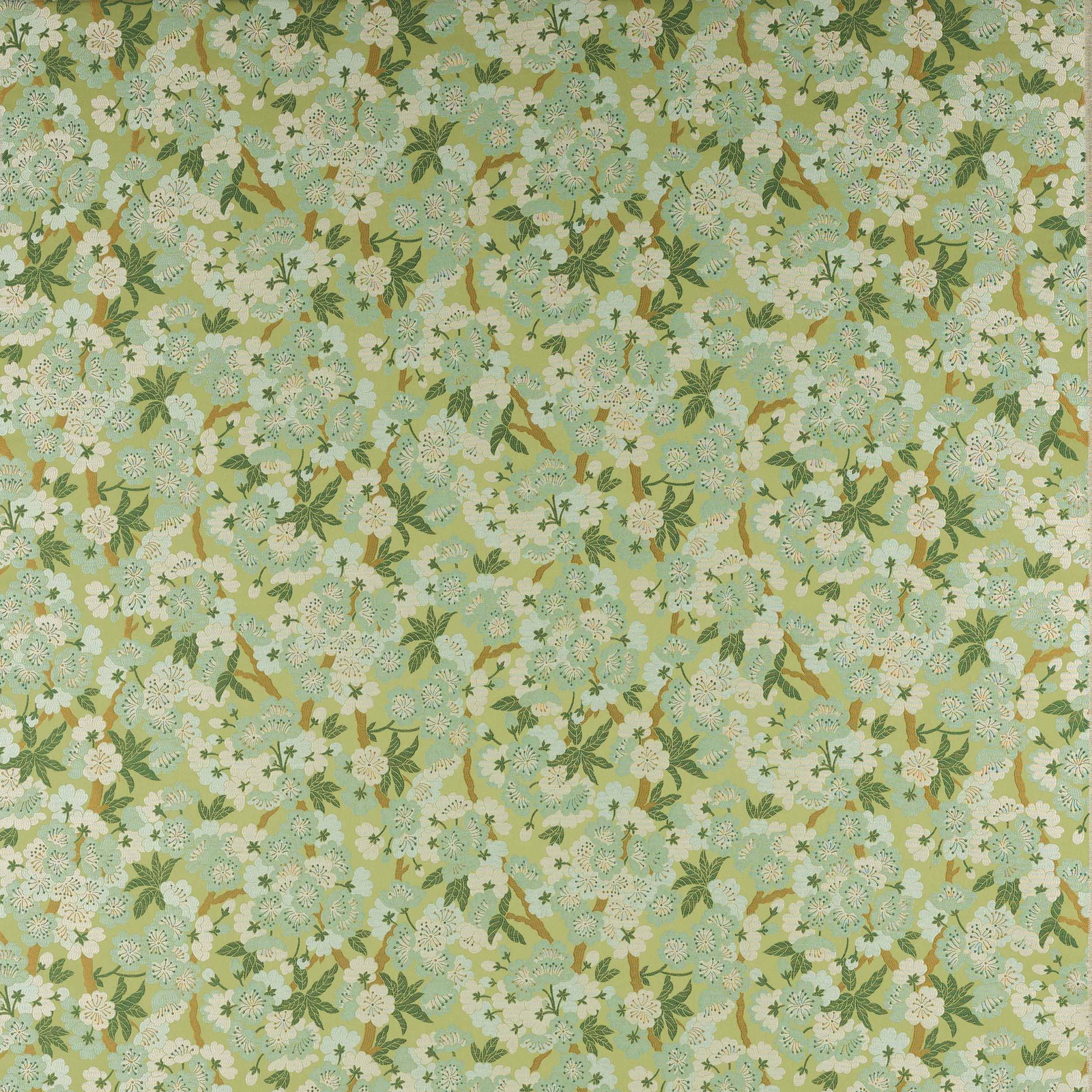 Soft green floral fabric with cream blossoms and olive leafy sprigs
