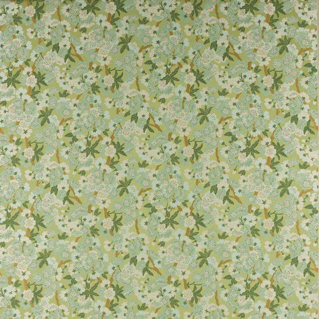 Soft green floral fabric with cream blossoms and olive leafy sprigs