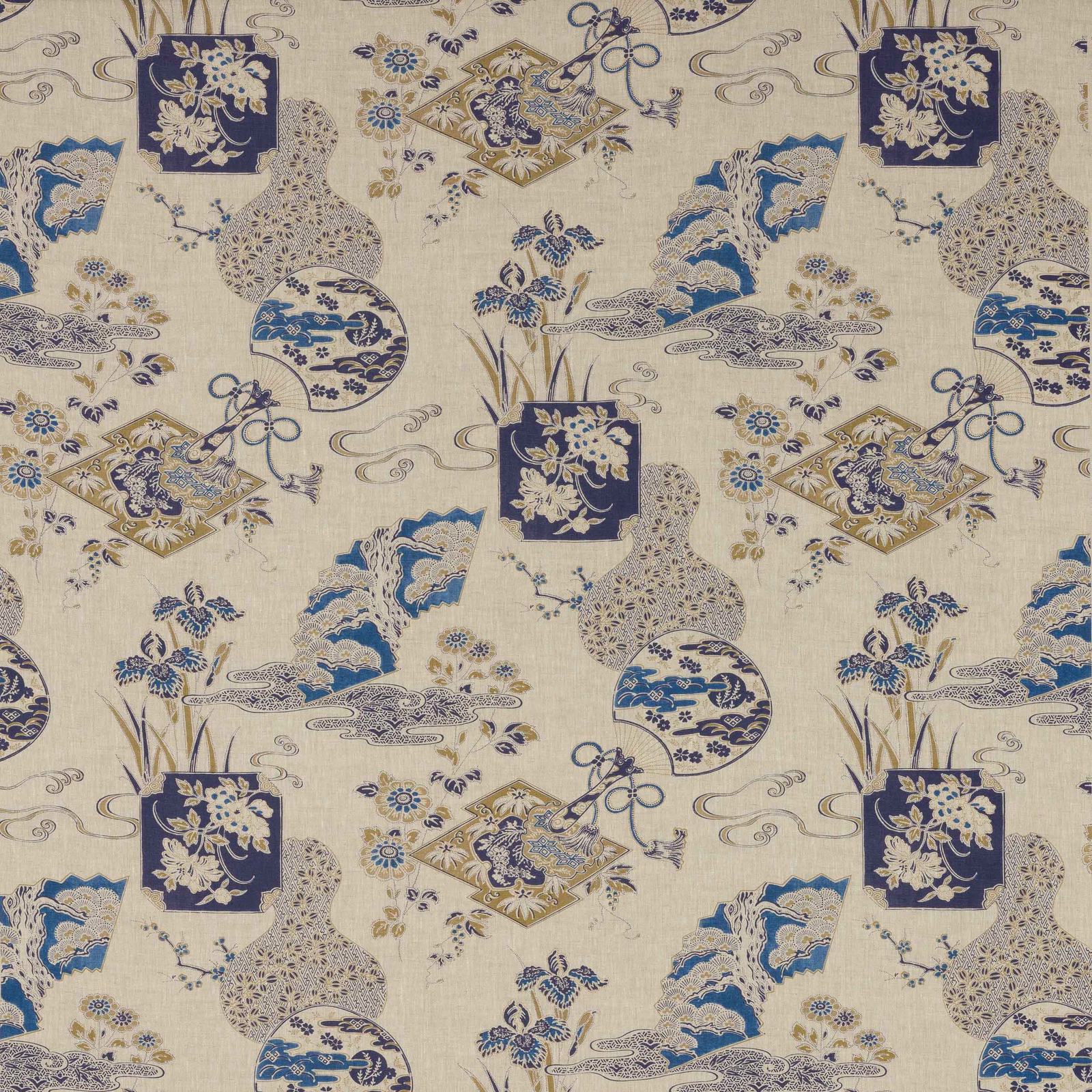 Large-scale blue and indigo patterned linen swatch on a cream ground