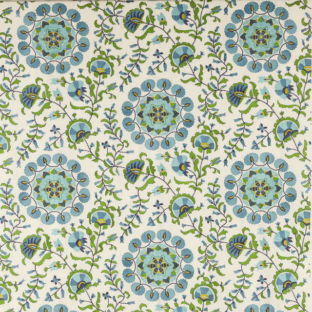Large celeste blue floral medallions with green vines on a cream fabric ground