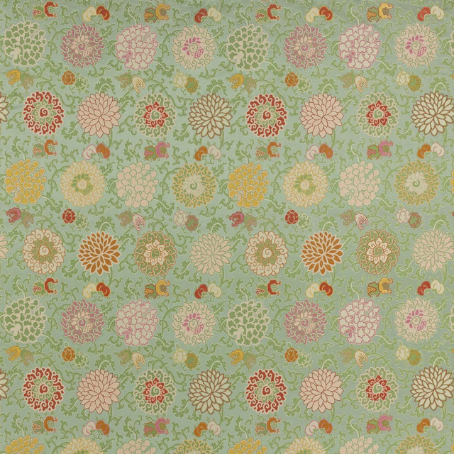 Large floral patterned fabric in soft jade green with blush, cream and coral motifs