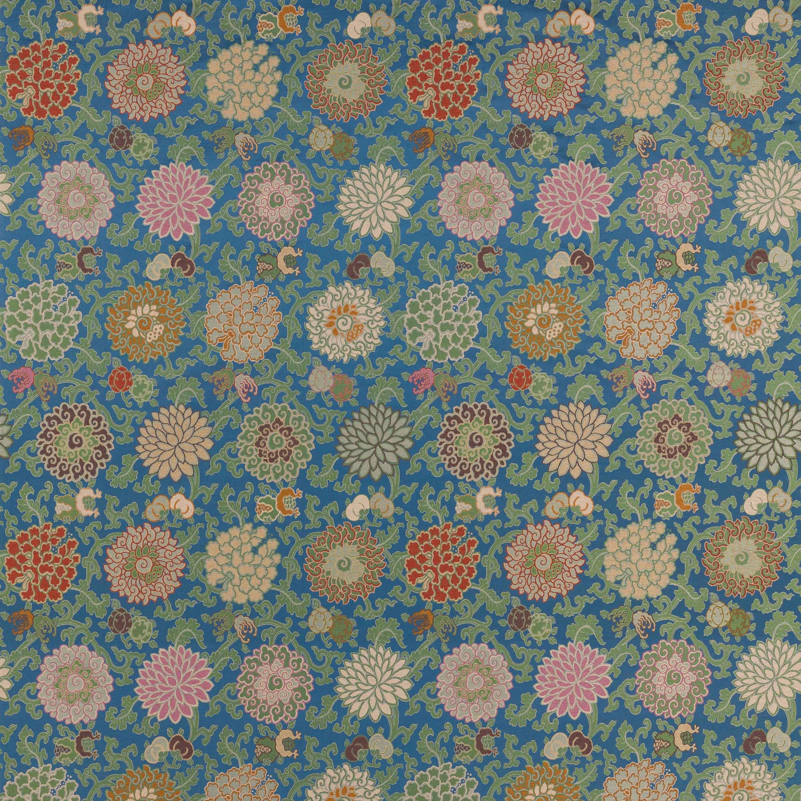 Blue floral fabric swatch with scrolling motifs and multicoloured blossom medallions