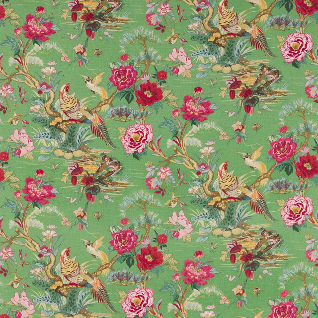 Painterly floral and bird print on a bright green linen ground