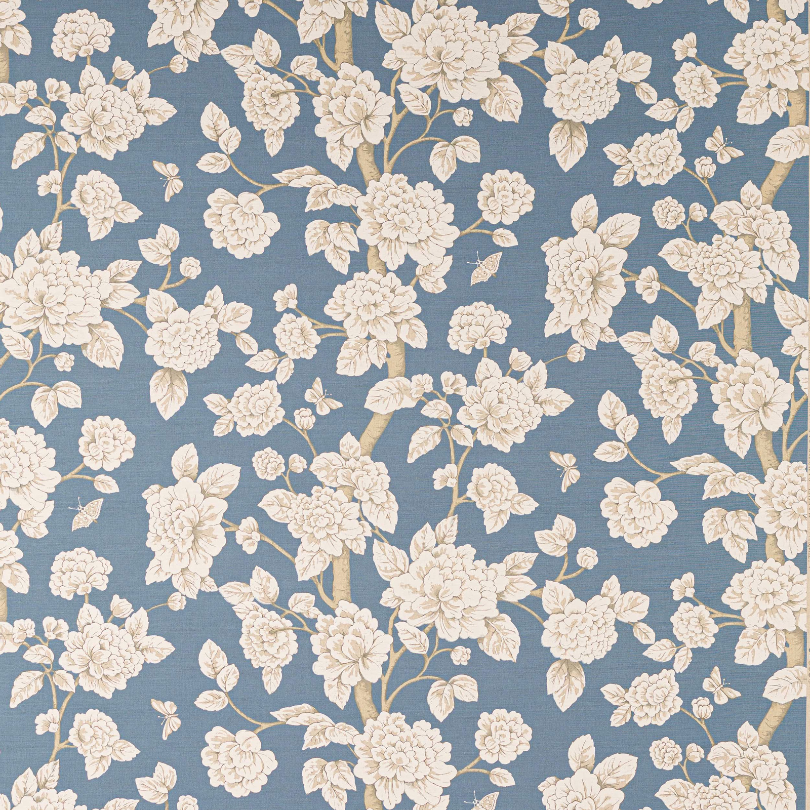 Dusty blue linen fabric with cream floral branches and blossoms