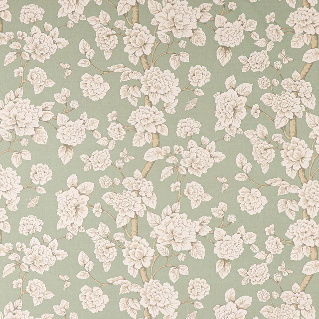 Soft celadon linen fabric with ivory floral blossoms and leafy branches