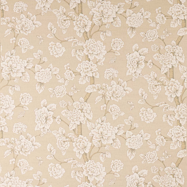 Soft ivory floral linen fabric with trailing blossoms on a warm beige ground