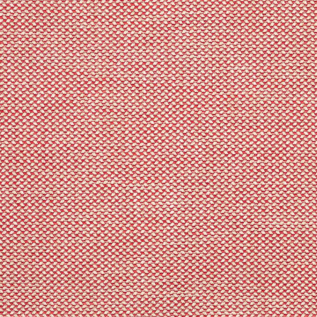 Close-up of a small-scale red and pink woven fabric with tiny textured checks