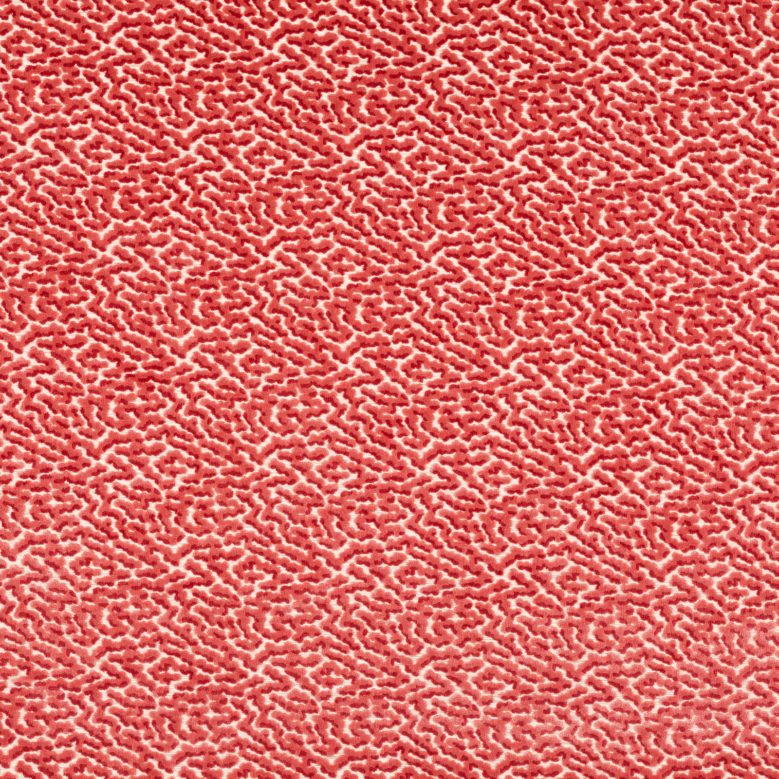 Coral pink textured abstract fabric with small irregular woven pattern