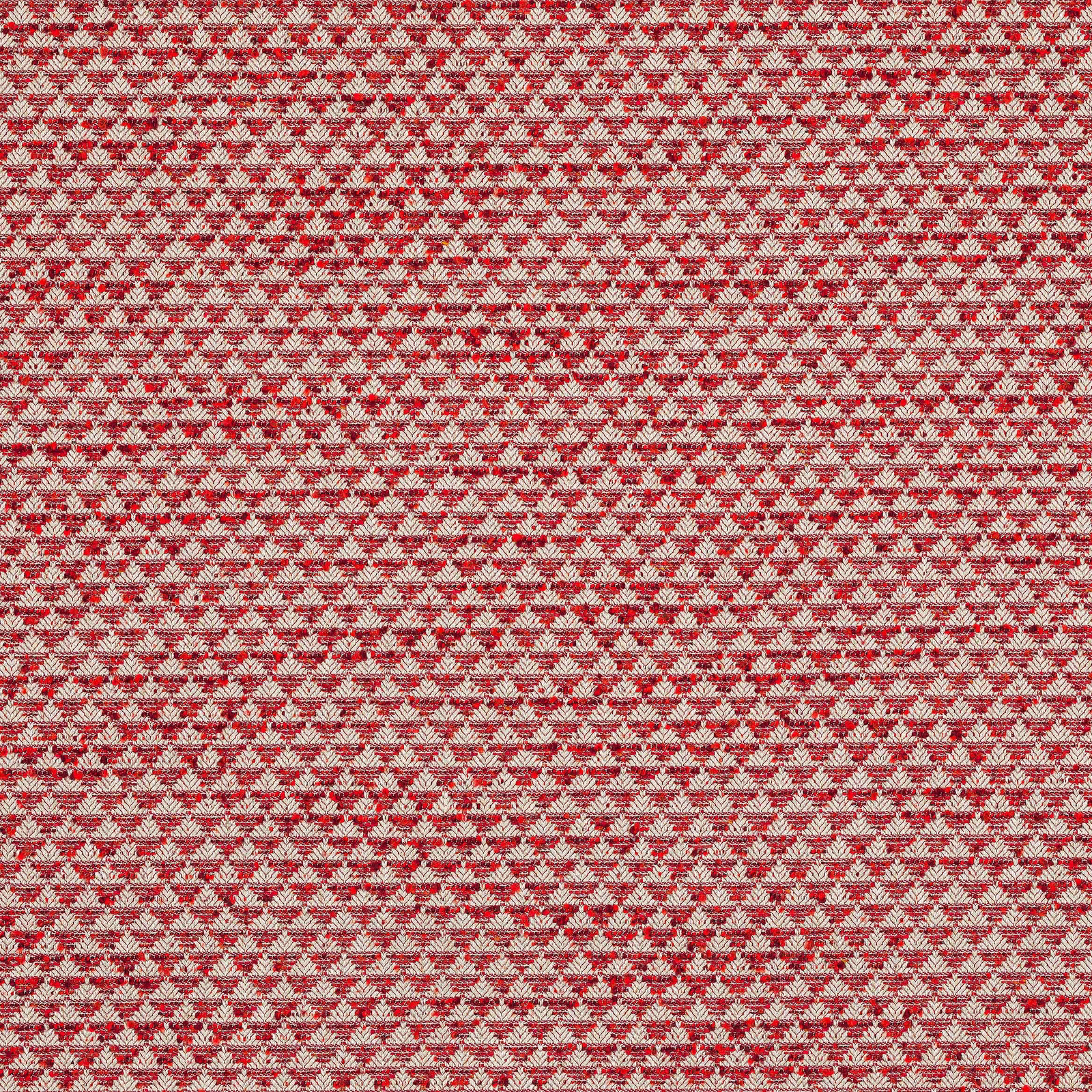 Small-scale red and ivory woven fabric with a tight repeating motif and textured surface